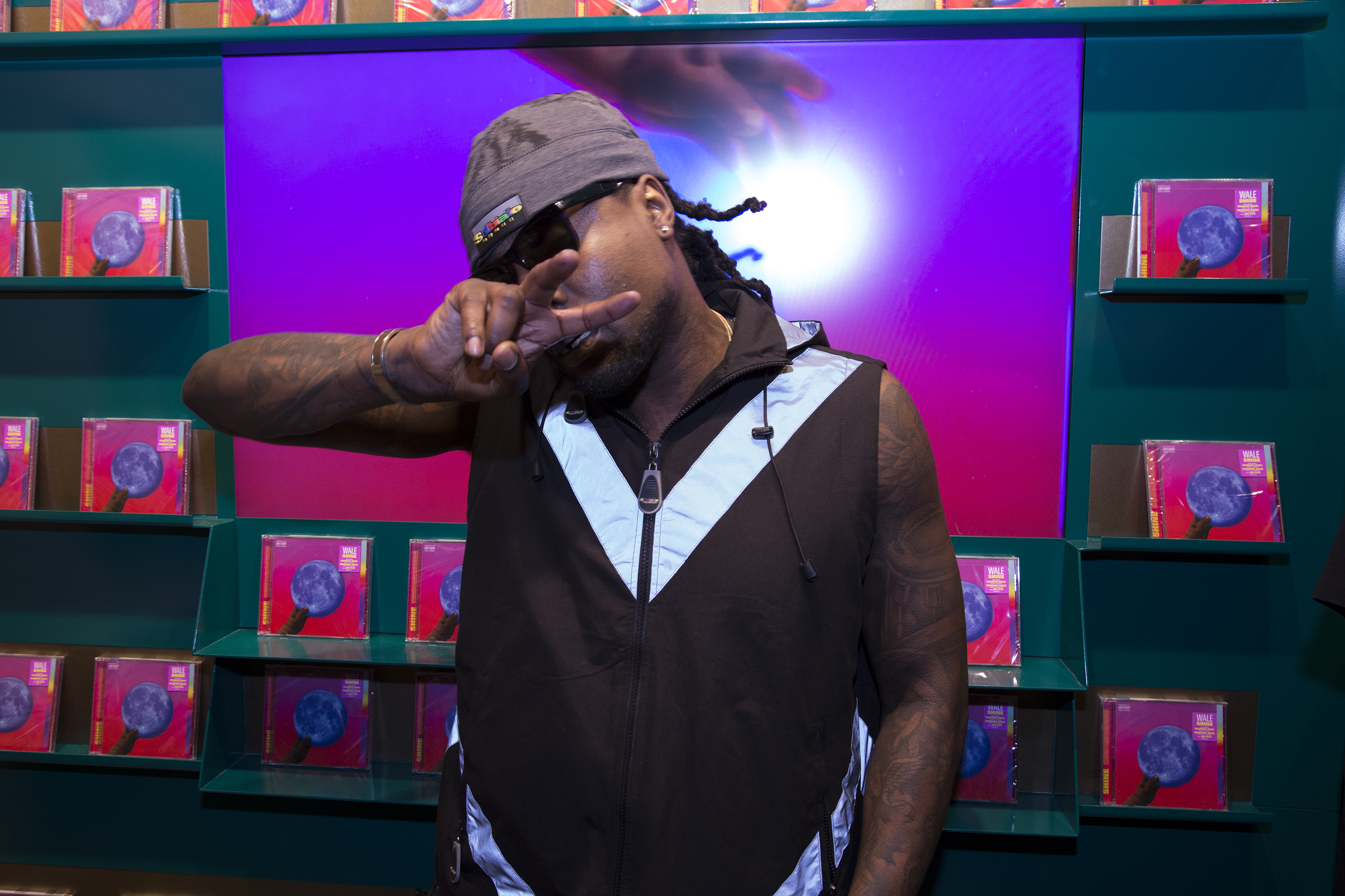 Wale Signs Copies Of His New Album 'Shine'