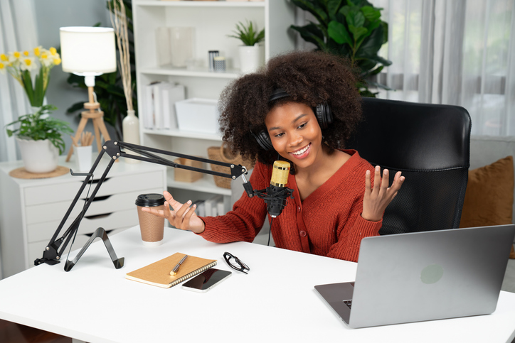 Host channel of beautiful African woman talking in broadcast. Tastemaker.